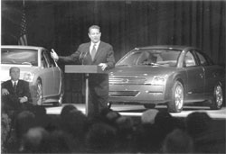 Photo: Al Gore Speaking in front of Energy Efficient Automobiles