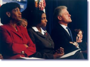The President, Rep. Maxine Waters, and Denise Stokes at the announcement of a new HIV/AIDS initiative for racial and ethnic minorities  (10/28/98)