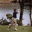 [PHOTO: President Clinton playing golf]