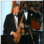 [PHOTO: President Clinton playing the saxophone]