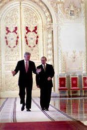 Presidents Clinton and Putin discuss issues as they walk through the Kremlin on their way to the Joint Press Conference.