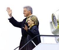 The President and the First Lady wave to the crowd upon arrival in Slovenia.