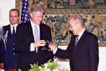 President Clinton toasts President Stephanopoulous during a state dinner at the Presidential Palace in Athens, Greece.