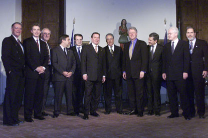 After dinner, President Clinton poses for a group photo at the Villa la Pietra with leaders who will participate in the 