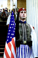 A Greek guard stands outside the Presidential Palace during the departure ceremony for the Clintons.