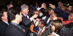 After his visit to the Franz Print Shop, President Clinton greets a crowd; Photo by Sharon Farmer, November 5, 1999.