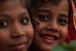 Two girls listen to the President's remarks to the people of Joypura, US Embassy, Bangladesh.