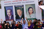 President Clinton is greeted by cheering crowds in Bangladesh.