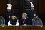 President Clinton listens with Vice President Kant and Speaker GMC Balayogi to remarks by Prime Minister Vajpayee.  Parliament Building, New Delhi.