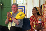 President Clinton participates in a discussion on women's empowerment at the Naila Village outside Jaipur, India.