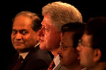 President Clinton participates in a hi-tech event with prominent members of the technological community.  Hi-Tech Center, Hyderabad, India.