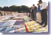 The President and First Lady at the Names Memorial AIDS Quilt exposition in Washington, DC